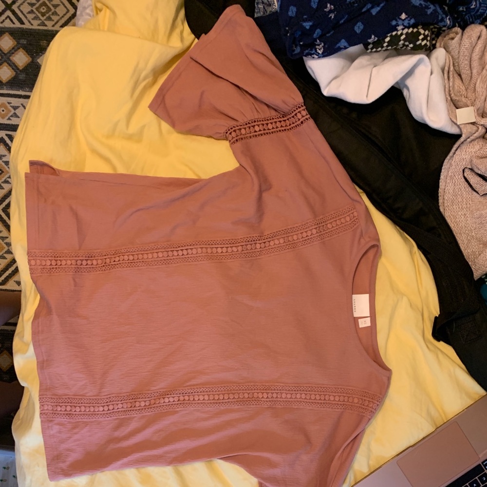 pink bell sleeved shirt